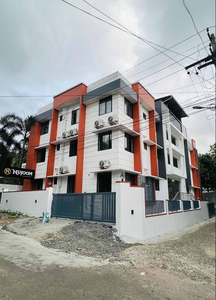 Hotel Nujoom Rooms & Apartments Kochi المظهر الخارجي الصورة